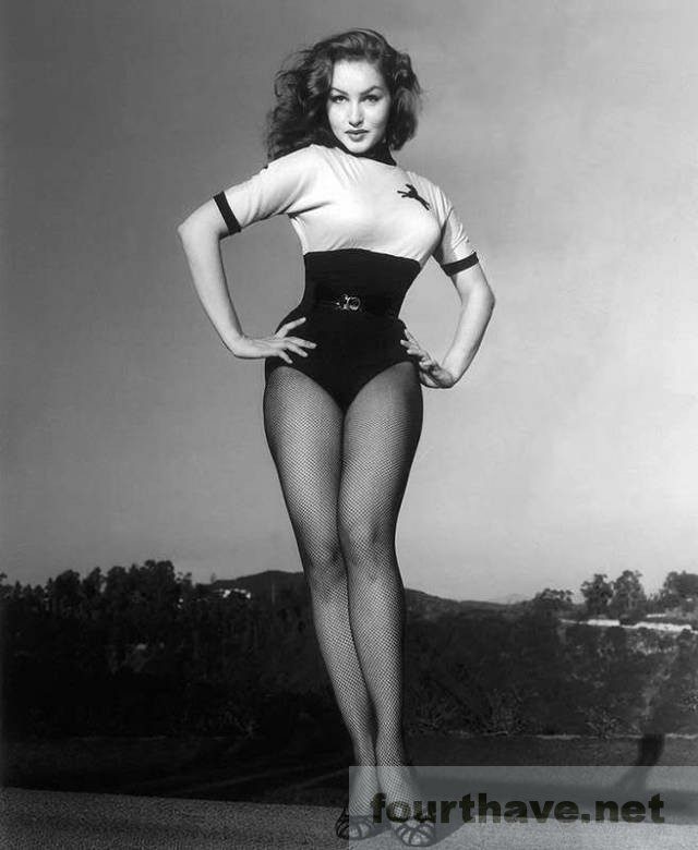 Julie Newmar showing off her sexy legs