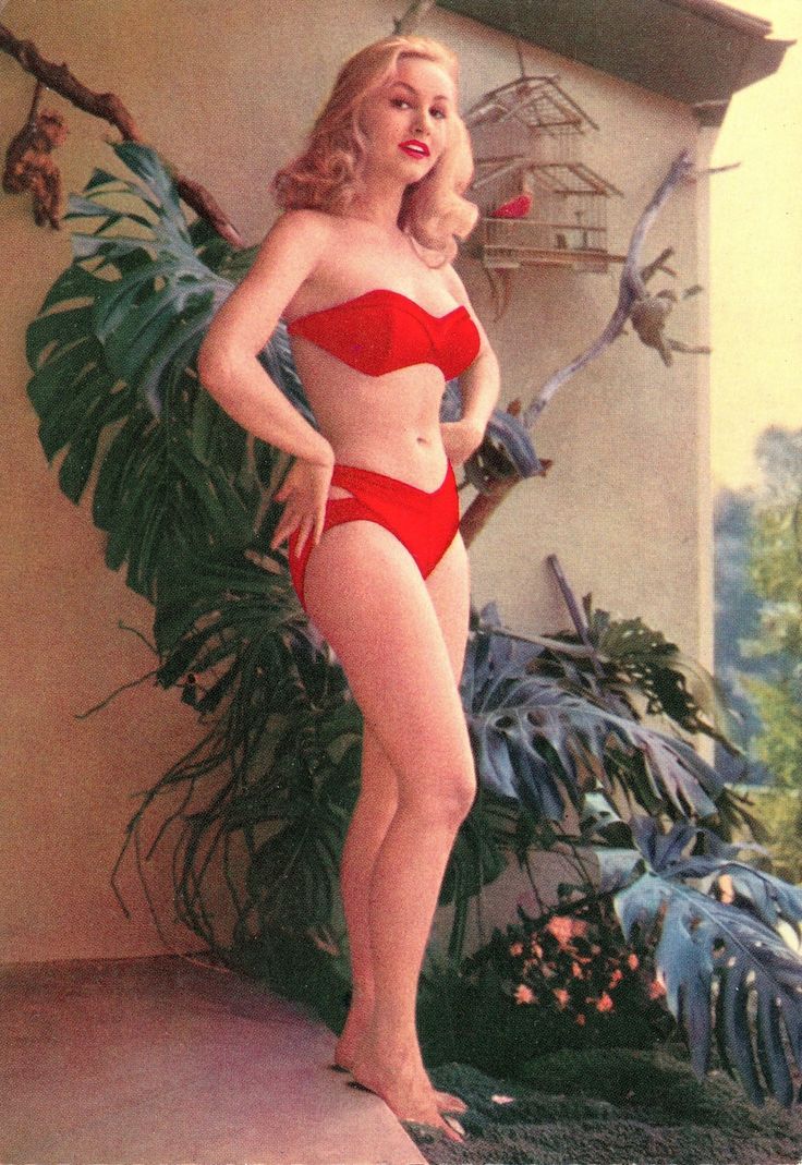 Julie Newmar in a red bikini