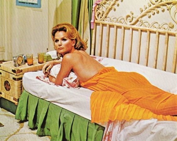 Lee Remick on a bed