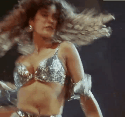 Teri Hatcher in silver dancing